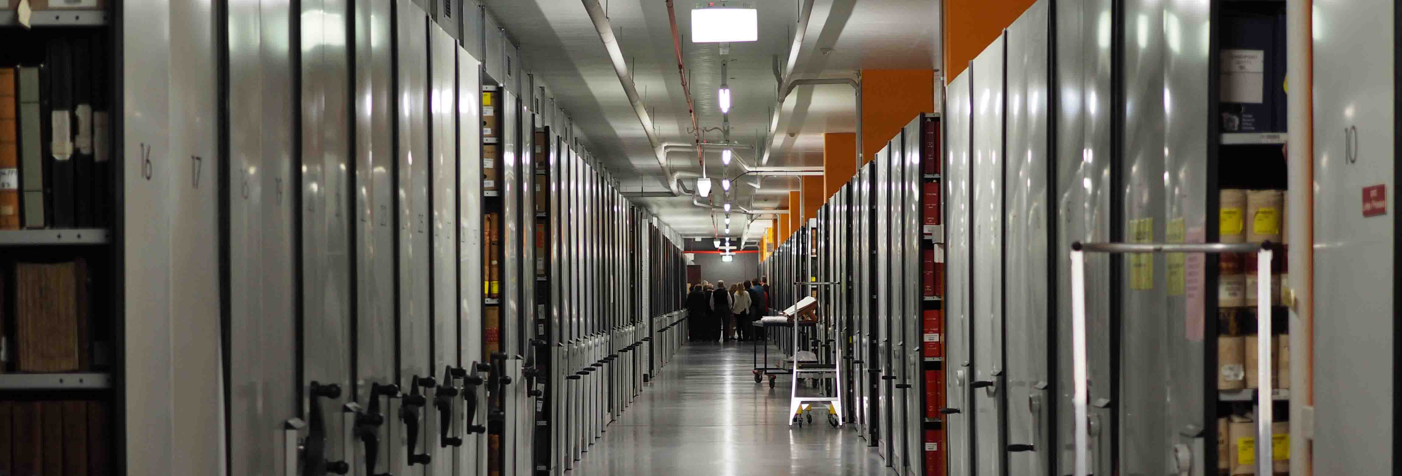 A view of the compactus in the repository at PROV Archival storage shelving