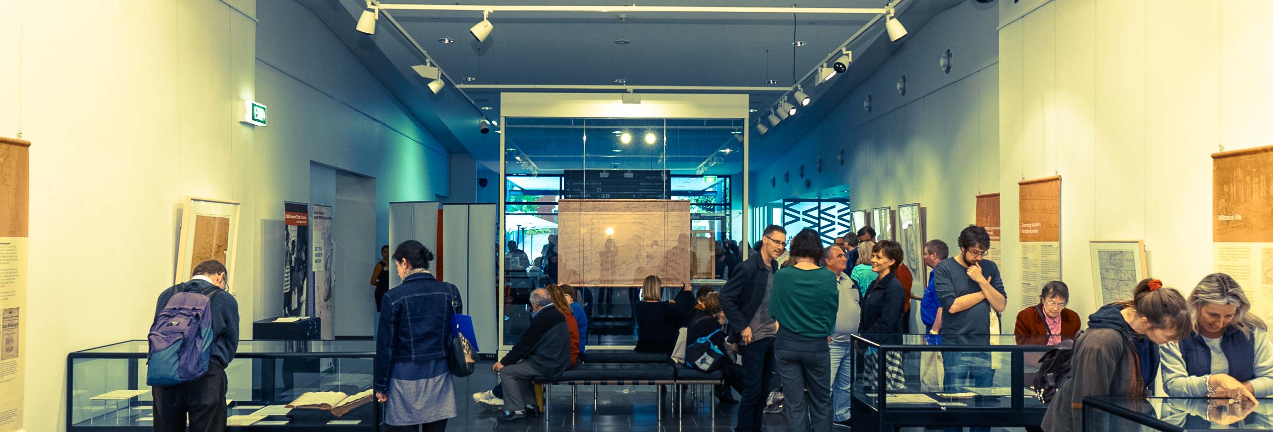 People enjoying an exhibition at PROV