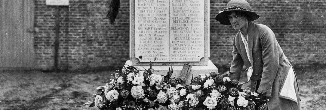The foundation laying ceremony at Villers-Bretonneux, France, 16 June 1923, 14520/P1 unit 1 item 4 Black and white photo, woman lays flowers at a memorial