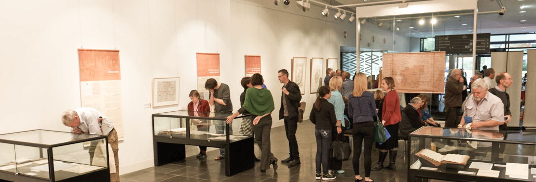 People enjoying an exhibition at PROV