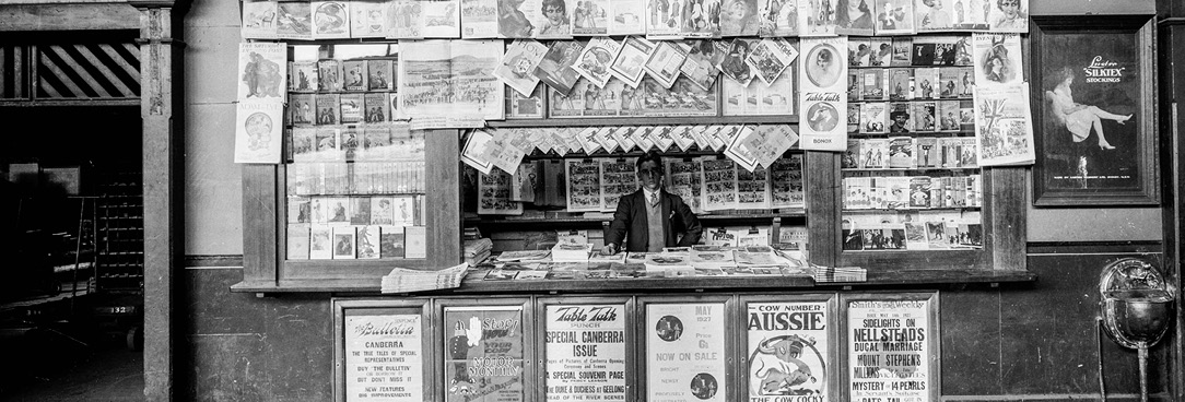 Newspaper stand at Spencer St train station, July 1930, VPRS 12903/P1 Box 23 Item 1