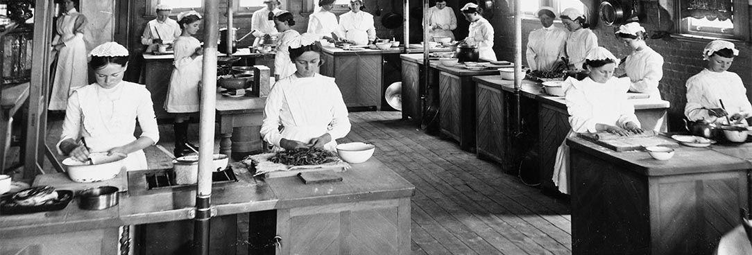 School kitchen. Date Unknown. VPRS 14562 P10 Unit 1 Image 4 Black and white image of girls in kitchen 19th century