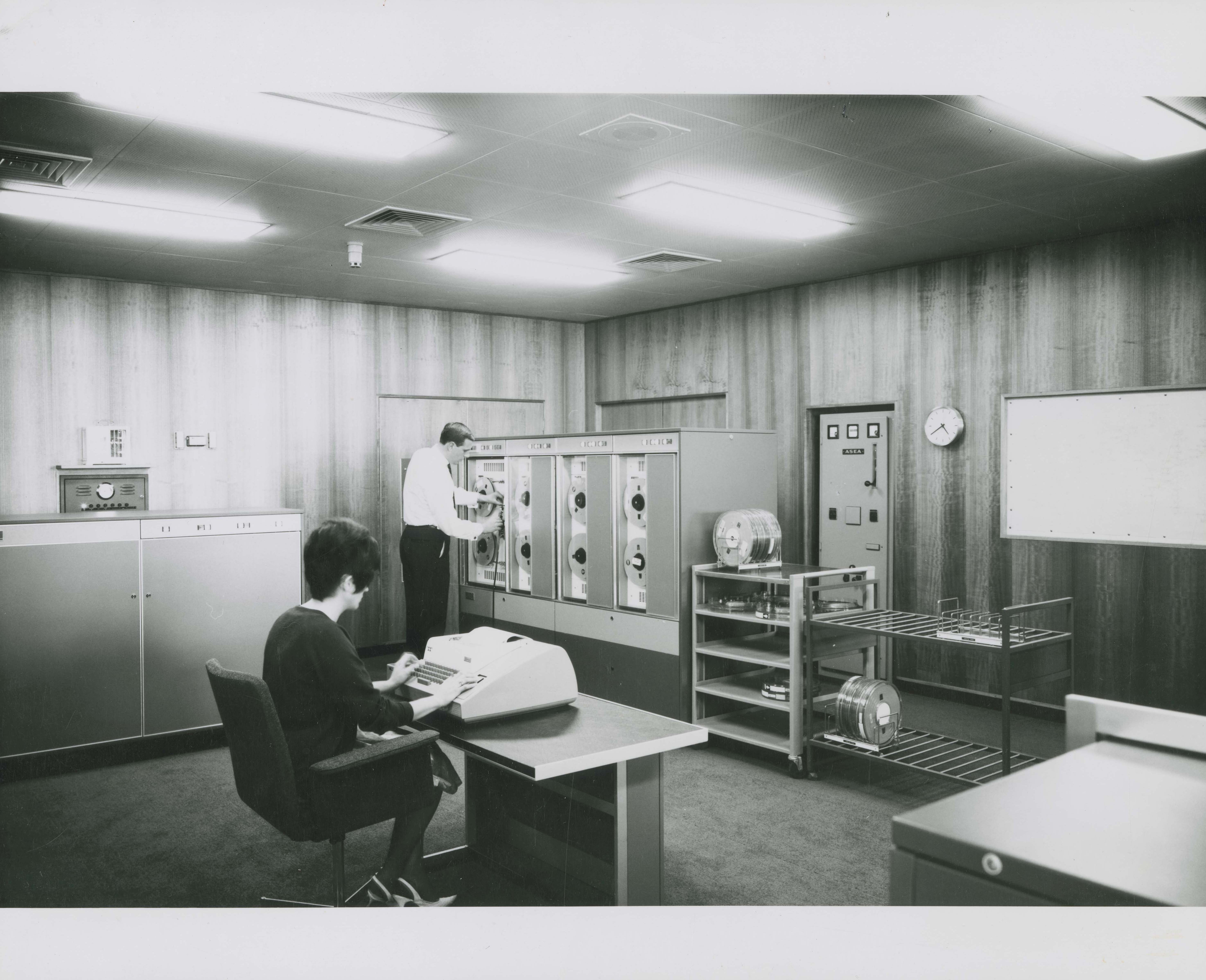 black and white photo woman typing