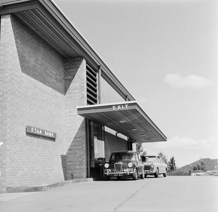 black and white photo of a drive in bank