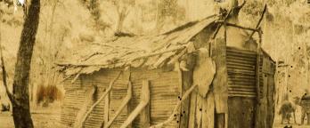 Sepia drawing of a shack