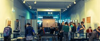 People enjoying an exhibition at PROV