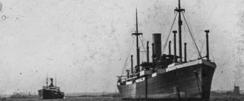 Black and white photo of a ship on the ocean