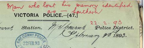 handwritten note saying he has been identified in red pen