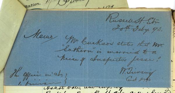 blue paper with handwritten note about relation to police inspector